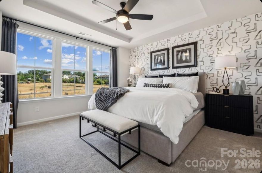 What's Special: Upstairs Storage | 1st Floor Guest Suite | Model Plan. New Construction - September Completion!  Built by America's Most Trusted Home Builder. Welcome to The Vail II at 1846 Alexander Village Main Drive in Senata at Research Park! This beautifully designed three-story townhome that blends comfort and elegance across every level, is not one to miss. The first floor offers a welcoming foyer with a private bedroom and full bath, along with access to the two-car garage and a thoughtfully placed drop area. Upstairs, the open concept great room connects seamlessly to the kitchen and casual dining space, creating a bright and inviting setting for everyday living. A walk-in pantry, nearby powder room, and a spacious deck extend the living area and make entertaining feel easy and refined. The third floor is dedicated to rest and convenience with three bedrooms, a secondary bath, and a centrally located laundry room. The primary suite feels serene and indulgent with a tray ceiling, a generous walk-in closet, dual sinks and vanities, and a spacious shower designed for daily luxury. When you live in Senata at Research Park you can enjoy on-site favorites like Starbucks and Chipotle, with Trader Joe’s and local dining just across the street. Research Park and Vanguard Campus are moments away. With major highways and the Lynx Blue Line nearby, these townhomes offer easy access to Uptown Charlotte, work, school, and weekend fun. Additional Highlights Include: fireplace, storage at second level, bed & bath instead of flex, white kitchen cabinets, quartz counters, and shower ledge at primary bath. Photos are for Representative Purposes Only. MLS#4381674