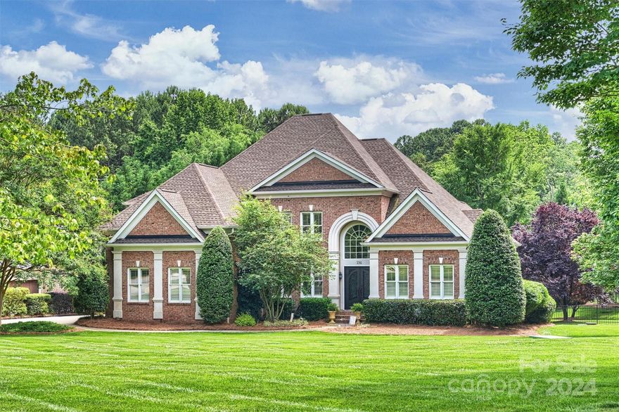 Welcome home to your private oasis on a 1.43 acre professionally landscaped homesite. This fabulous home features 4 BR's, 3 1/2 BTHS, + bonus room, office & sunroom. KT w/leathered granite tops, custom cabinetry & backsplash, oversized island, double wall ovens, SS appliances & pantry opens onto all seasons sunroom w/wood detailed ceiling. 2-story great room includes a FP w/gas logs. Large, ML primary BR with access to home office & butler’s coffee/wine bar. 3 BR'S, 2 BTHS & large bonus on UL. This stunner features a SW pool with/tanning ledge, covered patio w/FP, outdoor bar & grill and 3 car side load garage. Deeded boat slip at Pier Z #77 with plenty of parking. Resort style living at home! There are many additional wonderful amenities available living in The Point!