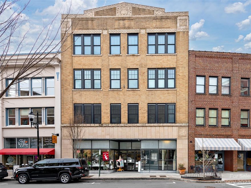 This splendidly handsome, historic ground floor apartment has been FULLY REMODELED and features a fabulous 260 SF PRIVATE GARDEN TERRACE open from the living dining area and the masterful suite. All is on the ground floor of the quiet, back end corner of the historic Nichols Building c.1928. In 1986, Jim Samsel,the reknowned architect, combined and converted the Nichols and W.H. Lord Buildings into luxury apartments. Enjoy private parking on the same level, secured storage in the basement and ample interior closet space. Conveniently located in Asheville’s synergetic downtown and steps away from the Grove Arcade, fine dining, shopping & superb entertainment, the Haywood Street quadrant has been attracting the admiration of the world since the 1920’s. And, with the eventual fruition of a masteful oasis to repurpose over .66 ajoining acres owned by the City, the area will become the most acclaimed and beautiful gateway to Asheville. Available furnished with a few personal exceptions,