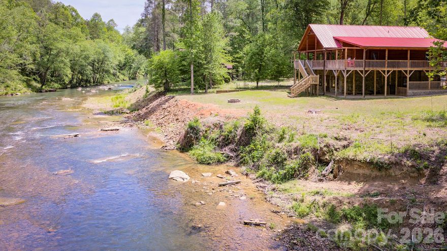 RIVERFRONT LOG HOME IN LAKE LURE, NC. Built in 2022, this 3358 sq ft, 4 bedroom, 3 bath, riverfront home overlooking the Broad River has over 1500 sq ft of covered porches and an in-ground swimming pool. If you're looking for a great vacation getaway or rental property, this one has it all.....from a huge game room, great fishing, swimming, kayaking and much more. A must see at $875,000.