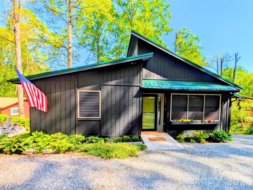 Tucked into the heart of Maggie Valley, 191 Forest Drive offers the perfect blend of mountain charm and modern comfort. The open floor plan of this single-level, beautifully updated home features stylish finishes and contemporary touches throughout with easy walk-in entry, creating a warm yet sophisticated retreat. Enjoy seamless indoor-outdoor living with ample outdoor spaces ideal for entertaining, relaxing, or simply soaking in the peaceful surroundings. Seasonal mountain views and the occasional visit from local elk and turkey provide a scenic backdrop. There is a wet-weather stream (dry right now) running the length of the property. Primary bedroom has walk-in closet and ensuite full bath. Unfinished basement has small workshop area and is encapsulated. Whether you're looking for a full-time residence, vacation getaway, or investment opportunity, this inviting mountain home is ready to impress. Short term rentals are allowed.
