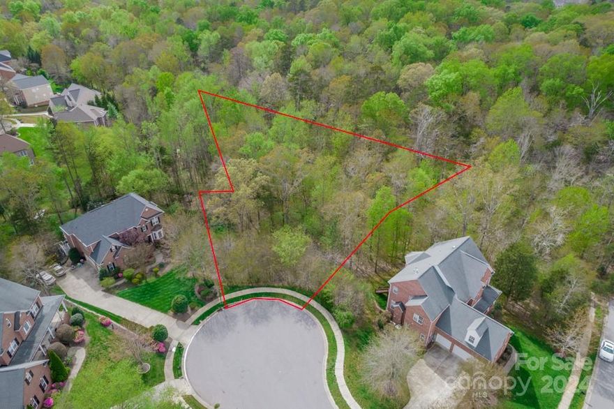 Large .89 acre lot in sought after Abbington!  This cul de sac basement lot is fully wooded and private.  Abbington has minimum square footage requirements. For 1-story residences: 2000 square feet, for 1 ½-story residences: 2400 square feet, and for 2-story and 2½-story residences: 2600 square feet.