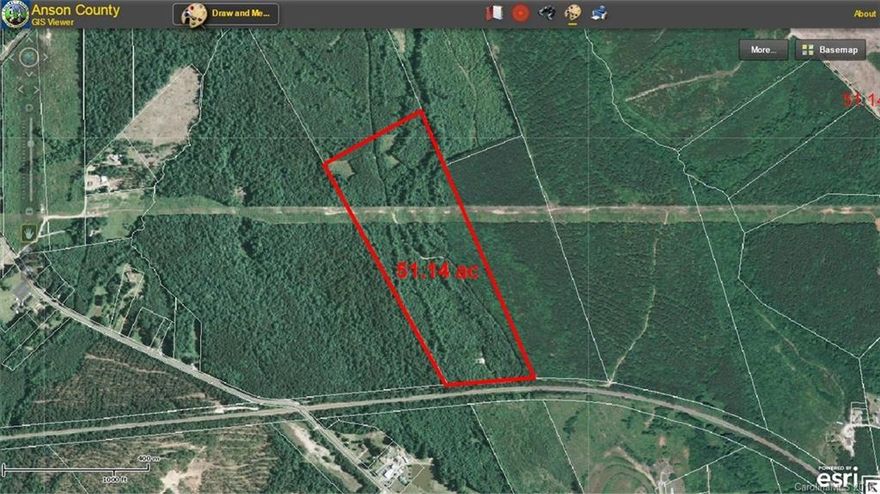 51.14 Acre hunters paradise!!!    Two story cabin furnished and wired ready for generator power.  Large 20x20 metal equipment building.   Lots of improvements including:  Picnic tables, several deer stands, 80 yard shooting range, roads, gates and food plots.  This is a turn key hunting escape that is ready to go!