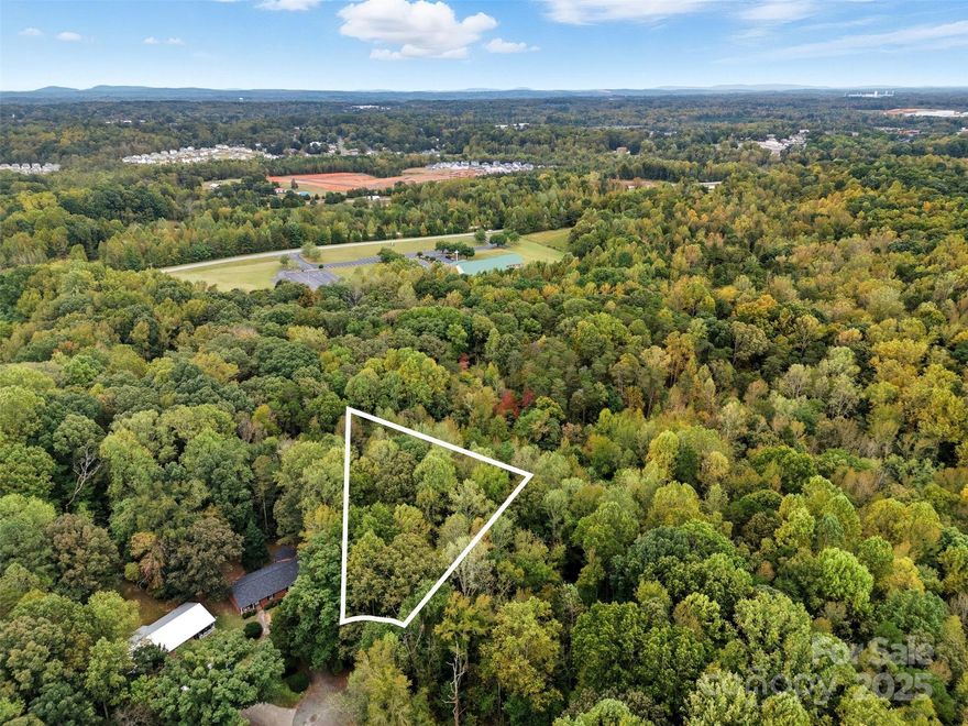 Prime opportunity to build an investment property in Lexington’s RM-1 zoning district. This .67-acre lot has already been perk tested and approved for a conventional septic system, providing peace of mind and faster permitting. The lot features a gentle 5–10% slope, public water access, and a wooded setting for privacy. Convenient location close to downtown Lexington, shopping, and major routes. Zoned RM-1—ideal for a small residential build.