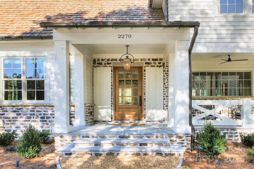 Simply the Best! Luxury living at its finest, this "like new" craftsmen constructed dwelling from New Old Homes has it all with no wait time to build. On an acre+ lot this home is all about modern upscale living with highend design trims & finishes. Chef Kitchen with Sub-Zero & Wolf appliances + imported 200yr old French bakers table for island, volume ceilings, floor to ceiling Tennessee stone fireplace in Great Room, site finished wide plank white Oak floors with Loba 2K invisible matte finish, main level primary with lush bath, all secondary bedrooms have ensuites. Outdoor oasis has pool, spa, phantom screening, pool pavilion with kitchen & fireplace + sports court! In one of Charlottes most desired suburbs, mins to the best that Fort Mill living has to offer; ample shopping & restaurants. Step out onto the Carolina thread trails or visit the nearby Catawba River & Anne Green Close Greenway. Do not miss the opportunity to make this incredibly well-priced house your home!