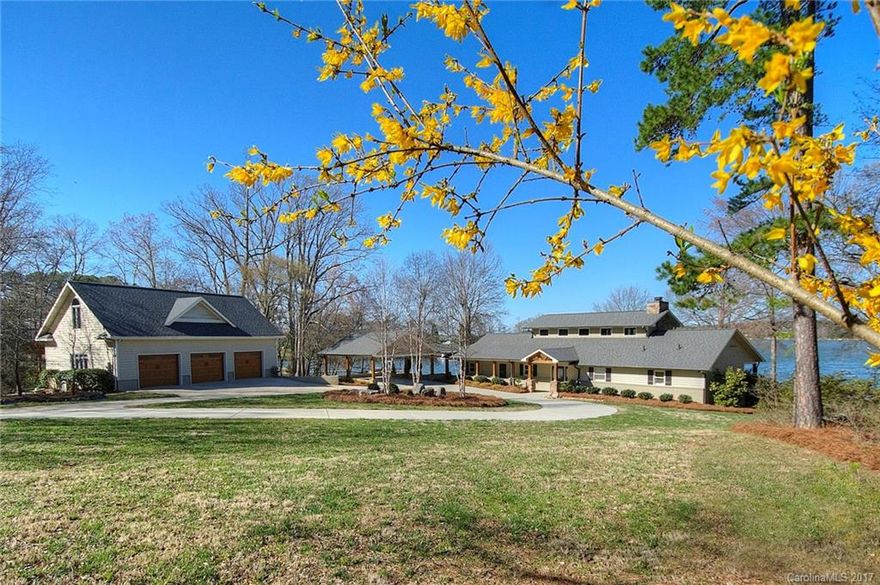 Main channel views from nearly every room of this magnificent dual-master waterfront retreat! Completely renovated & move-in ready. Engage your inner chef in the gourmet kitchen, complete w/ Thermador range, wine chiller, & under-counter ice-maker. Heated/cooled detached garage w/ 2nd floor storage area. New covered dock w/lift under construction. Multiple outdoor living spaces to choose from. From the red oak hardwood floors to the grand stone fireplace, this home is sure to be your favorite.