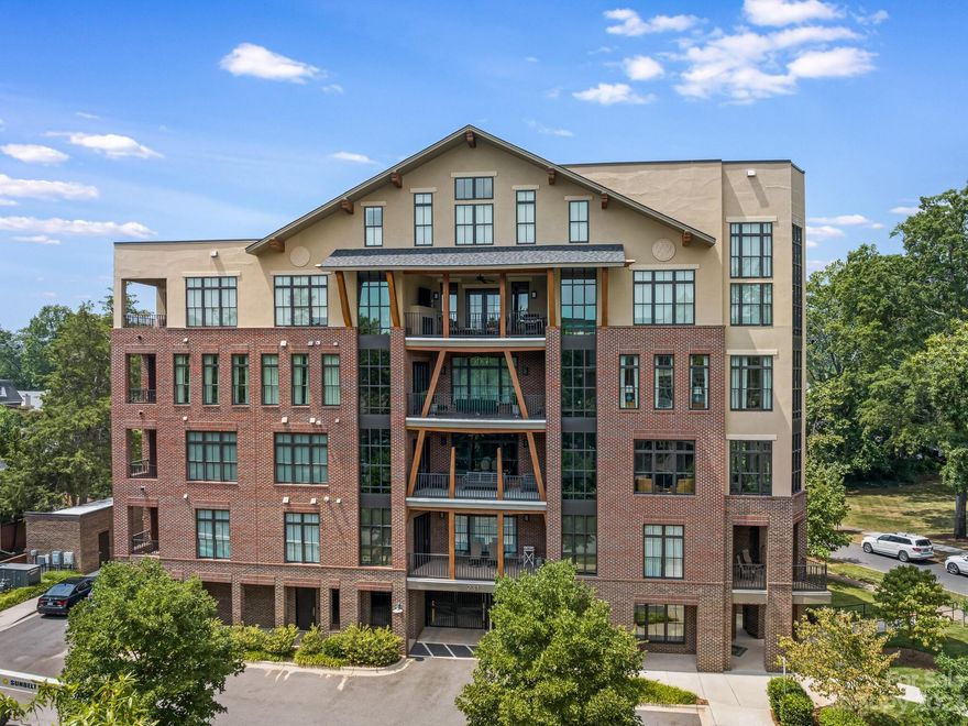 Welcome to 2312 Selwyn Avenue, located in the heart of Myers Park. Constructed in 2018, this home offers Calacatta gold marble on all countertops. The kitchen has custom cabinets with glass inserts, a Shaws farm sink and high end appliances, including a beverage refrigerator. The kitchen is open to the spacious living spaces. There is a gas fireplace in the dining room and on the covered terrace accessible from the dining room. An additional covered terrace is located off of the primary bedroom and family room. The primary bedroom and bathroom are filled with natural light with a large custom closet. There are two additional bedrooms, each with its own en-suite bath. Visual Comfort lighting throughout, custom hardware by Katonah Hardware and Farrow & Ball painted cabinetry are a few of the custom details. There are 2 covered and secure parking spaces as well as ample guest parking and onsite storage. The terrace views overlook a park like setting, which is rare to find in Myers Park.