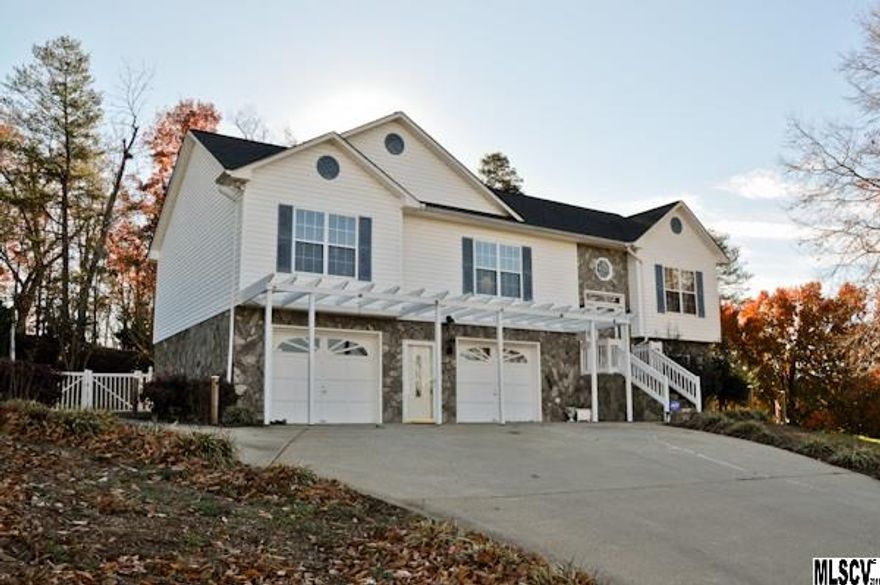 **Exciting Update** This property now includes addition lake front lot nestled in quiet cove & has dock & electrical additions. Lake Hickory access and water views! 3 bedroom, 3 bath, split foyer home has open concept with split bedroom plan. Master bedroom has large master bath & closet. Kitchen has abundant cabinets and counter space, heated/cooled sun porch to enjoy your morning coffee. Basement has large family room w/gas log fireplace, a full bath & features excellent storage. Laundry hook-ups on main level & basement. Back yard is fenced & has covered patio for grilling & entertaining. Hickory city address, but no city taxes!