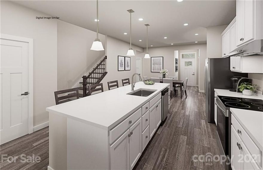 END UNIT! Brand new, open concept floor plan with Primary Bedroom on main level.  Spacious kitchen with large island opens to bright Great Room area with lots of natural light.  Pleasant dining area is perfect for entertaining.  Two large secondary bedrooms and a full bath on the second floor, with an option for a home office.  Plenty of storage is available as well. LOADED WITH UPGRADES! REPLICA OF THE MODEL HOME.