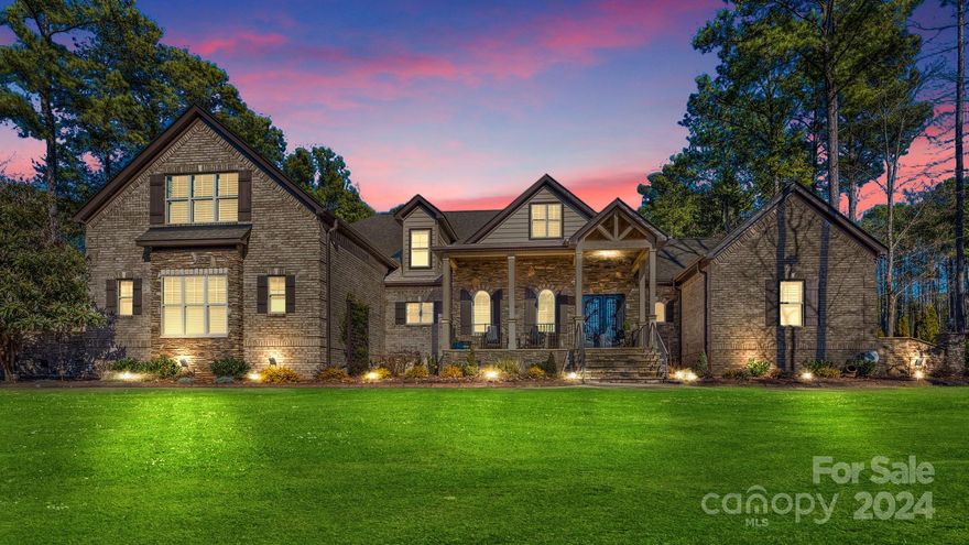 This is the one!Welcome home to this stunning, freshly painted, all-brick home nestled on a picturesque road w/ seasonal water views of Lake Norman. An entertainers dream, fit for multi-gen living with 2 primary suites! Ample parking + 3-car garage, epoxy floors & custom storage system. Landscape lighting & rocking chair front porch. Inside, open concept floor plan seamlessly blends cozy living w/ effortless entertaining. Impress guests & host game watching w/ the expansive outdoor entertaining area . Grill & bartend by the outdoor kitchen, dine el fresco under the stars., enjoy S'mores by the firepit, or unwind in the jacuzzi. Retreat to your spacious owner's suite w/ patio access, luxurious en suite + generous walk-in closet. This thoughtful floorplan provides everyone their own space. The perfect home for making lifelong memories. Enjoy the community pool, or nearby Trump Ntl Golf Club offers membership for those seeking country club amenities. Lots of updates! See attached.