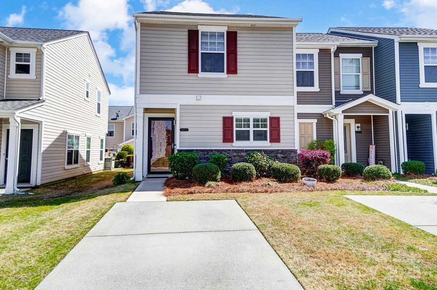 This bright and sunny end-unit townhome in the gated community of Catawba Village offers 3 bedrooms and 2.5 bathrooms. The main floor features a welcoming entry hall, a half bath, a spacious kitchen with a walk-in pantry, a dining area, and a cozy family room. Upstairs, the primary bedroom includes its own private en-suite bathroom and walk-in closet. Two additional guest bedrooms share a full bathroom. A convenient laundry closet with stacked machines completes the upstairs. Enjoy the fenced back area with a patio, perfect for relaxing. The home also includes a one-car driveway with extra parking directly across the street. The community offers an outdoor pool, clubhouse, street lights, and lawn maintenance. Located in the award-winning Fort Mill School District, with easy access to highways, uptown Charlotte, the airport, and nearby shopping and dining.