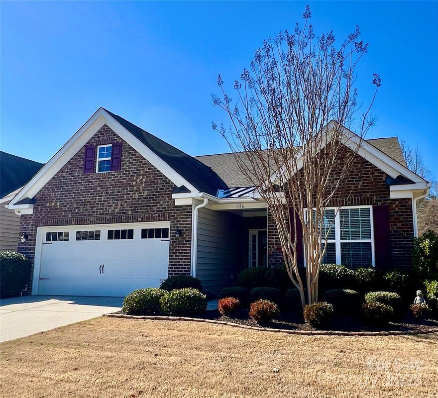 Welcome to 156 Carmen Way, a charming 3-bed, 3-bath home nestled in the highly sought-after Walnut Creek community. This serene retreat offers a fenced, tree lined backyard w/a peaceful creek flowing behind, creating an ideal setting for outdoor relaxation. The open-concept design features sleek finishes throughout. Beautiful spacious kitchen w/granite countertops & tile backsplash, a walk-in pantry, tile flooring, SS appliances, & a large island. Gorgeous hardwood floors flow seamlessly throughout, adding warmth & elegance. Living area w/gas log fireplace. First-floor primary suite boasts a luxurious en suite bath w/a large walk-in shower, dbl vanity, & oversized walk-in closet. Upstairs, a versatile loft area, full bath, & additional bedroom offer comfort and space. Enjoy the benefits of low Lancaster County taxes, fantastic Walnut Creek amenities, & convenient access to shopping in Indian Land, SC, and Waxhaw, NC—offering the perfect blend of comfort, convenience, & community!