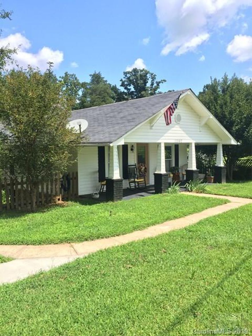 Enjoy this 2 bedroom, 1 bath Bungalow located within walking distance to historic, downtown Valdese. The interior of this home features a open kitchen, living room and dining room, ample sized bedrooms, and a downstairs living space with wood burning fire place! The exterior of the home includes a covered front porch, level front yard and private back yard with a small stream at the rear of the property. This home is a definite must see!