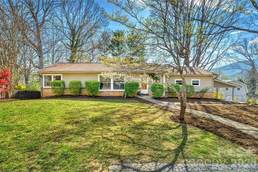 Welcome to this beautifully maintained home in the highly desirable Grovemont community. Blending charm with a stylish mid-century modern feel, this home offers both character and comfort. The spacious primary suite and bathroom are privately situated on the right side of the home, featuring a separate sunroom and a generous walk-in closet—your own peaceful retreat.  The kitchen and dining area are bright, spacious, and inviting.  The kitchen features all stainless steel appliances that are just over a year old, including a high end Zenith gas stove, perfect for any chef!  The large living area boasts a freshly painted stone fireplace with new white birch gas logs, adding to the style and comfort of this home.  There is a finished room in the basement (not included in the square footage), that makes a great flex space, game room, or office.  Enjoy stunning mountain views and an open, level, fully fenced backyard.  HVAC, heat pump, furnace and roof have all been replaced by current owners between 2019 and 2020.  To view this must-see property in person-call today!