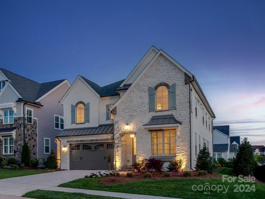 The kitchen dazzles with a beautiful marble mosaic backsplash, sparkling quartz countertops, and an oversized island that seats six. Standing at the sink, you can see the entire covered outdoor living with a warm fireplace. The study, which is tucked behind the dining room and enclosed with barn doors, is the perfect hideaway for when you need some privacy. A large bonus room is located at the top of the stairs, making it the ultimate place to bring friends and family together for movie night. Or, it can double as a spacious playroom for kids instead. The luxurious owner's suite and bath are secluded and lead to an impressive closet, big enough to fit everything and then some. Located in Fort Mill, hotspots like Kingsley and Baxter Village are just a few minutes away. This home will also have beautiful Bahama Shutters in the Out Door Covered living area and plantation interior shutters on most of the windows!