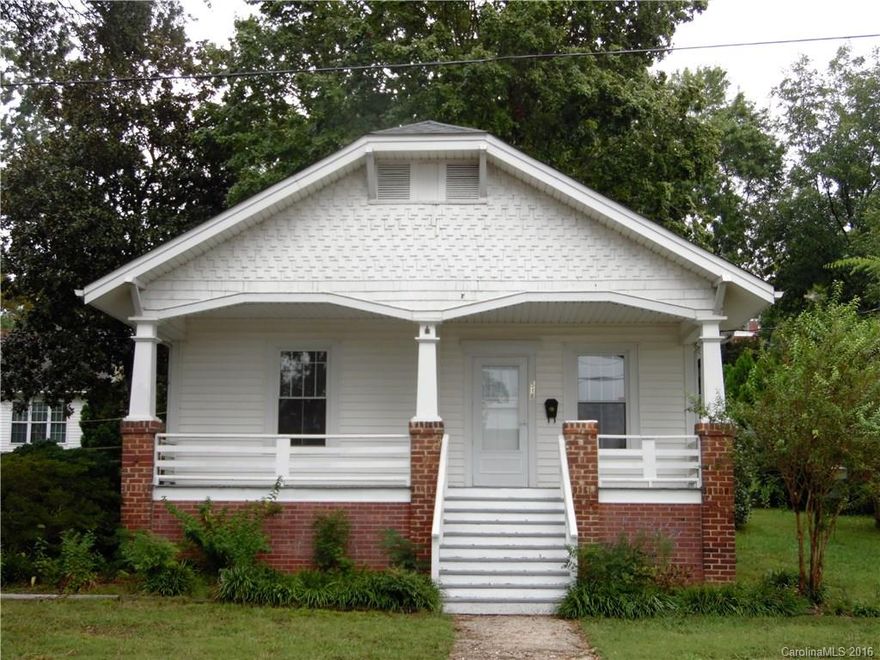 Two bedroom, 1 1/2 bath home with replacement windows. Original hardwood floors, spacious kitchen, laundry room, double car garage, patio and front porch. Well maintained and ready to become a home. Convenient to shopping. Sellers would love to entertain an offer; easy to show!