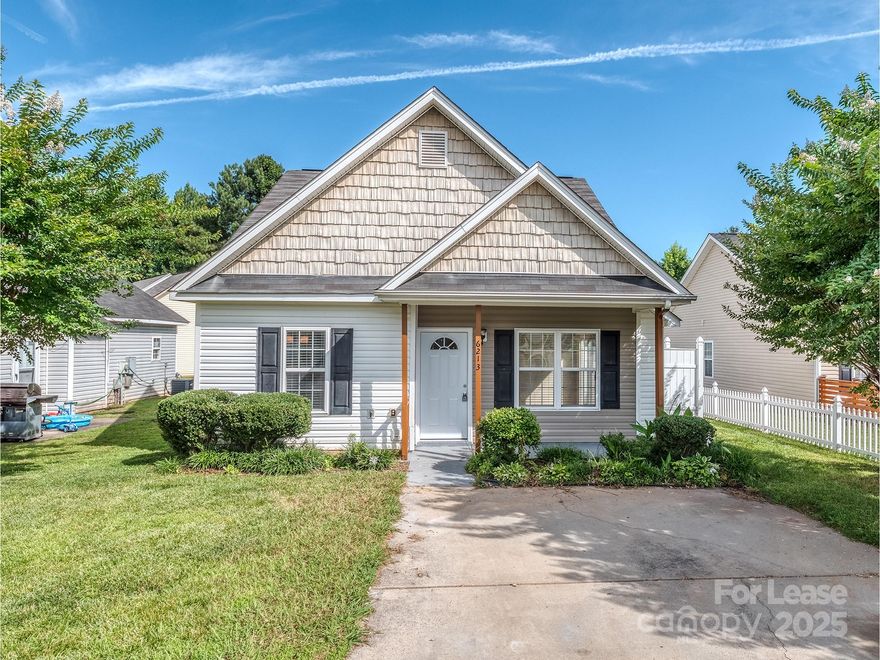 Discover your oasis in this charming bungalow ranch home in convent location in Charlotte. Enjoy the convenience of vaulted ceilings in living & primary and LVP flooring throughout, complemented by a cozy gas fireplace in the living room. With a fenced backyard underway, this residence promises both privacy and security. Delight in the updated kitchen featuring sleek gray cabinets, stainless steel appliances, and new countertops. Retreat to the spacious primary bedroom boasting a walk-in closet and a luxurious en suite bath with a separate shower and garden tub. Plus, relish the ease of access to major highways like I-85 for seamless travel throughout Charlotte. Just a short drive from Uptown, NoDa, and University, this location offers the best of city living. Freshly painted throughout makes it easy to move right in and make this your new home sweet home!