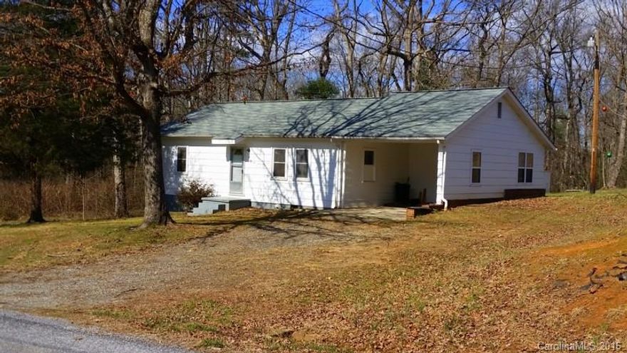 Quaint 2BR home located on .48acre in the heart of Alexander County. This newly remodeled home is tucked away on a street with very little traffic. This home offers many updates including: custom cabinets built by Milstead Cabinetry, new roof in 2012, new flooring and paint throughout, updated fixtures, remodeled bath & kitchen, new counter tops, septic pumped in 2012, updated windows, and much more! The spacious kitchen and dining are great for cooking & dining! kitchen has lots of cabinets.