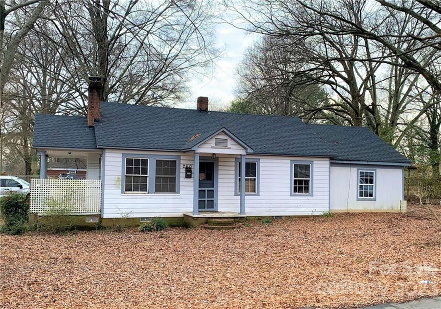 INVESTOR SPECIAL - Hard to find CORNER LOT suitable for a DUPLEX per Charlotte City Planning.   This property is 7 minutes from downtown Charlotte and in an up-and-coming area that is being revitalized.  Current house has 3 bedrooms and 1 full bath and has been used as a rental for many years.  House has gas wall furnace for heat and no AC.  Hardwood floors in most of the house, and vinyl flooring in kitchen and 3rd bedroom.  This property is also listed in MLS under LOTS/ACRES/FARMS (MLS #3939208).
All information to be verified by Buyer's agent.