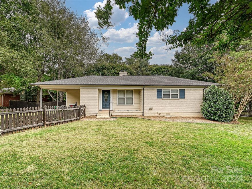 Amazing location in popular Madison Park! Close to Park Road Shopping Center which includes all of life's conveniences- dining, shopping, grocery, bars and parks! This 3 bedroom/2 bathroom home includes beautiful original hardwoods floors and an updated kitchen with quartz counters, new backsplash and pantry. Primary bedroom is large enough for a king size bed with its own updated bathroom attached. The house includes two additional bedrooms and a full bath. The large backyard with tiered deck is perfect for entertaining and relaxing. Fully fenced in BACK and FRONT yard with shed and fire pit make for a great escape!