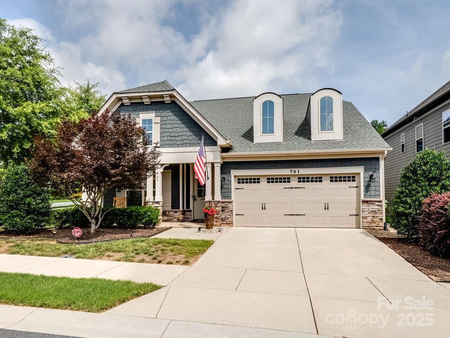 MOTIVATED SELLER!!!  Absolutely perfect home in top-rated Fort Mill School District! This pristine Cal Atlantic-built gem sits on a manicured corner lot just minutes from golf, dining, and Uptown Charlotte. Shows like a model with a main-level primary suite featuring coffered ceiling, spa-like bath, and huge walk-in closet. Gourmet kitchen is a chef’s dream—large island, 5-burner gas cooktop, wall oven, soft-close drawers, granite, stainless appliances, and custom pantry. Open floor plan with elegant study, gas fireplace, and designer finishes throughout. Plantation shutters, custom lighting, crown molding, and neutral tones make this home truly move-in ready. Enjoy the professionally landscaped yard with extended paver patio and new Andersen doors. Low HOA! A flawless blend of luxury, comfort, and location—this one has it all, get it while you can!! Assumable VA loan at 2.25% through current loan servicer and must qualify!!  ALL APPLIANCES but Refrigerator STAY!!!