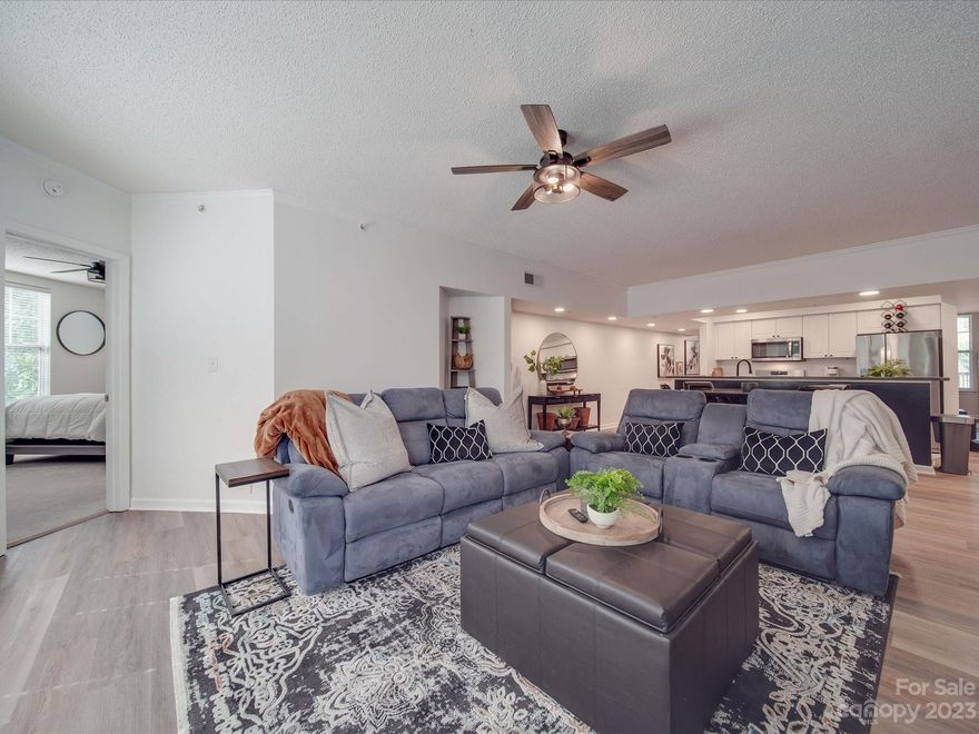 Introducing a beautifully furnished two-bedroom condo in the heart of Charlotte's 4th Ward. This charming residence is perfectly situated across from shopping and picturesque park walkways. Step inside, and you'll be greeted by a spacious open concept design. The large windows flood the space with natural light. One of the standout features of this condo is the beautiful balcony, providing you with a private outdoor space for taking in the city views. This condo also boasts a rooftop terrace, with breathtaking panoramic views of the city. You'll find yourself in close proximity to the stadium, making it a breeze to catch your favorite games and events. When it comes to shopping and dining options you won't be disappointed. Don't miss the chance to experience the best of Charlotte living in this beautifully furnished 4th Ward condo – a unique blend of urban excitement and tranquility in one of the city's most desirable neighborhoods. All Furniture to convey with property.