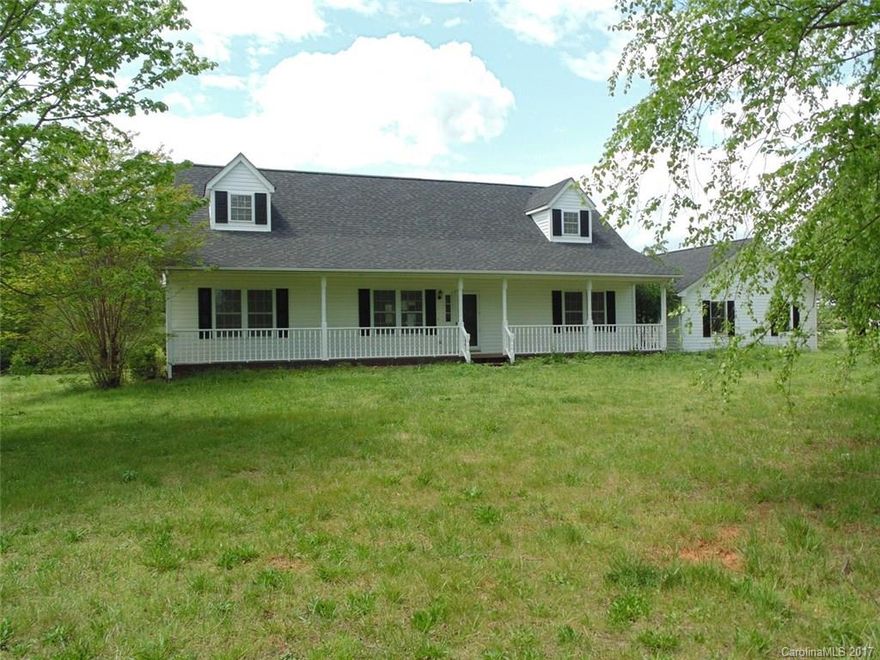 Fresh paint and new carpet.  New heat/ac units.  Master on the main floor.  Nice screen/covered pass thru to garage.  Eat in kitchen and formal dinning.  Nice corner lot.  Large covered front porch.