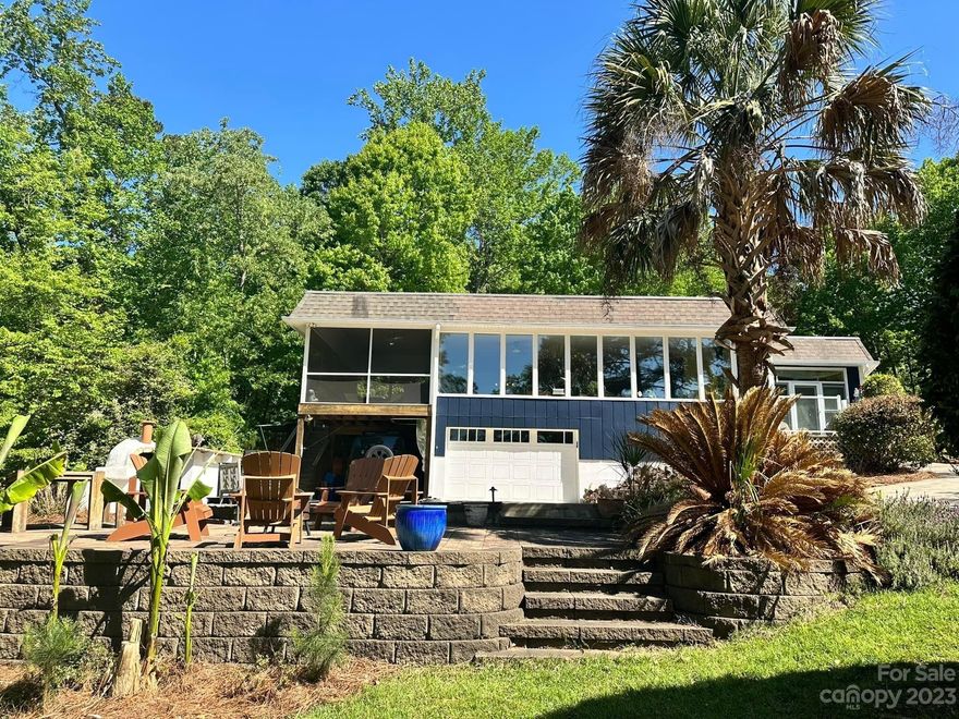 Selling Agents Comp Sale:  From Sellers FSBO Listing:  Welcome to your dream lakefront home located in the picturesque community of Tega Cay, known for its top-rated school system, walking trails, community pool, pickle ball courts, golf course and tennis courts. This stunning property offers a 4-bedroom, 2-bathroom house with a garage and ample space for your family and friends to enjoy. As you step outside, you'll be greeted by the beauty of the outdoors with a spacious screen porch, outdoor entertainment area with a pizza oven and a large yard surrounded by water.

This property includes two waterfront lots totaling almost 0.5 acres, providing plenty of space to enjoy all the lake has to offer, from fishing to boating and everything in between. Don't miss out on this once -in-a- lifetime opportunity to own a lakefront oasis in the highly sought-after community of Tega Cay.