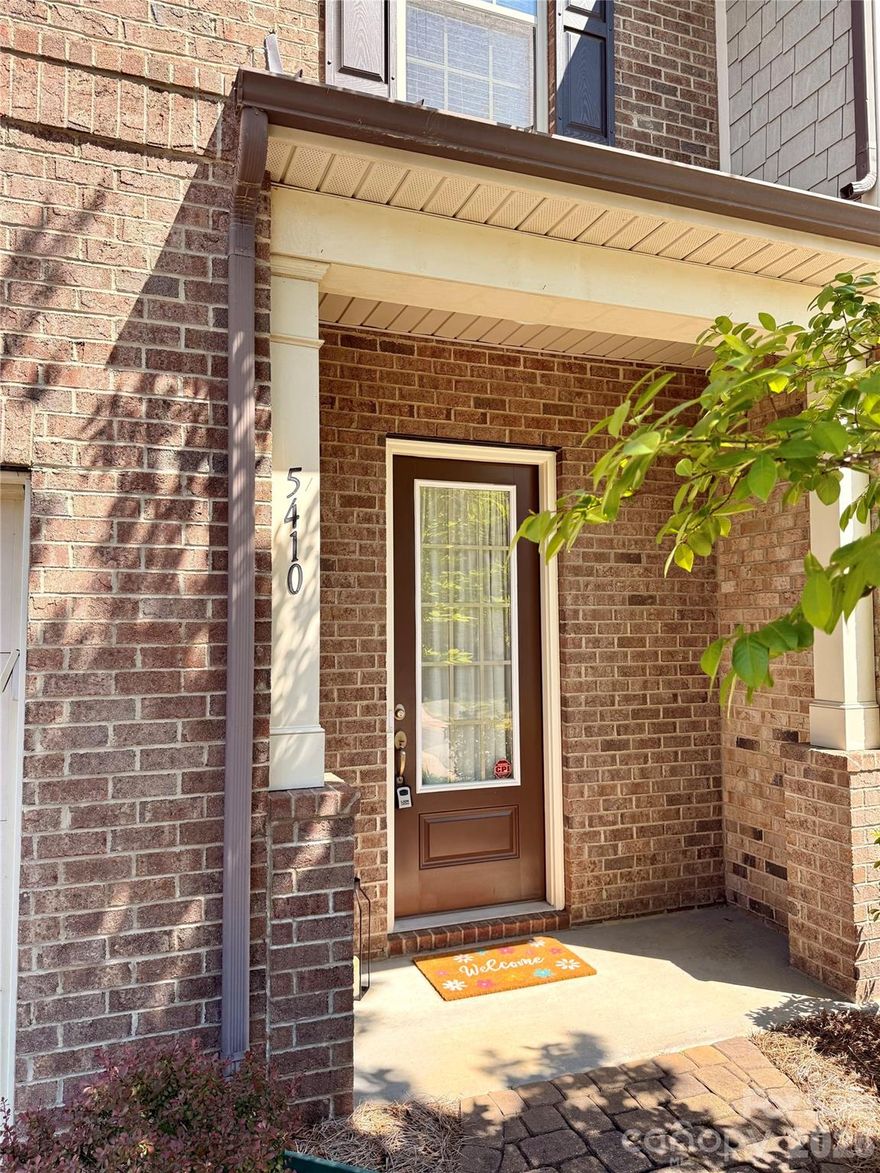 Beautifully maintained and freshly updated, this stunning townhome offers refined living within one of the area’s most desirable gated communities. The open floor plan showcases large windows, wood flooring, and a spacious great room with a gas fireplace that opens to a private Travertine patio. The kitchen and primary bathroom cabinets have been updated to a timeless white finish.

Experience the prestige, privacy, and peace of mind that come with a well-managed community and a strong HOA—where comfort and luxury are perfectly aligned. Ideally situated just moments from Providence Commons and the Promenade on Providence, with convenient access to McKee Road, Ballantyne Commons, Providence Road, and I-485.