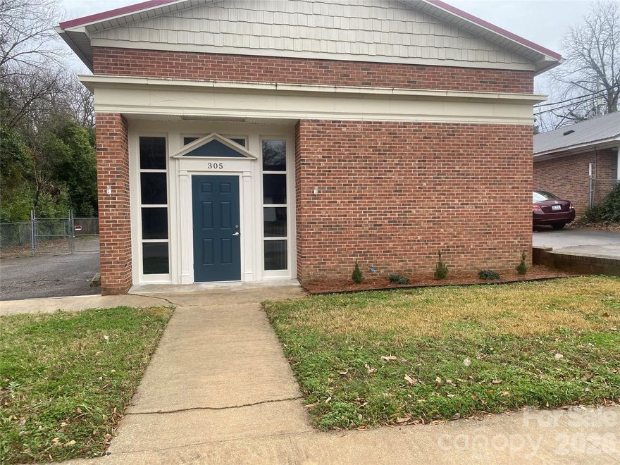 Zoned B-2, Neighborhood Commercial ,Attractive, low maintenance building. Brick veneer, metal roof, Reception area, 2 offices freshly painted, 2 rest rooms, 867 square feet open area for storage or divide for additional offices. Partially fenced parking area at rear of lot. Heat pump & water heater 7 years old. 200 Amp Svc,220 receptacles available. Handicap accessible, 15 parking spaces beside building additional spaces at rear of building.