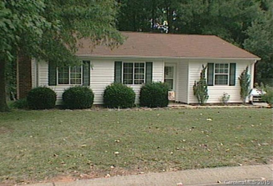 Great home freshly painted and new flooring. Open living room with vaulted ceiling and wood burning fireplace.  Bright Kitchen with breakfast bar and a large separate Dining Room. Spacious bedrooms with large closets. Deck off the laundry room is great for entertaining. Plenty of yard that backs to trees.