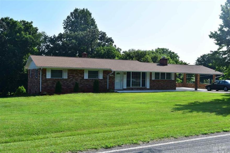 Conveniently located Full brick home with nice level .96 yard, tons of updates and improvements to this great home with convent location to shopping/dinning and close access to 321 and I40. Gem of a home with all the updates. Tax Value does not reflect updated value. Full brick home features a spacious living area with hardwood floors and a large picture window. Den with fireplace and 1/2 bath. Spacious remodeled kitchen with stainless appliances, 2 seated bar, recessed lighting, and good size dining area. Remodeled bathroom with jetted hot tub and tiled separate shower. Hardwood flooring finished to perfection. Basement has finished room with tile flooring and full bath for a bedroom or additional living space, rec room. Exterior features include nicely landscaped .96 acre yard level playing area front or back yard. Recently added back covered patio great for relaxing, entertaining. Storage garage in basement for lawn equipment and more.