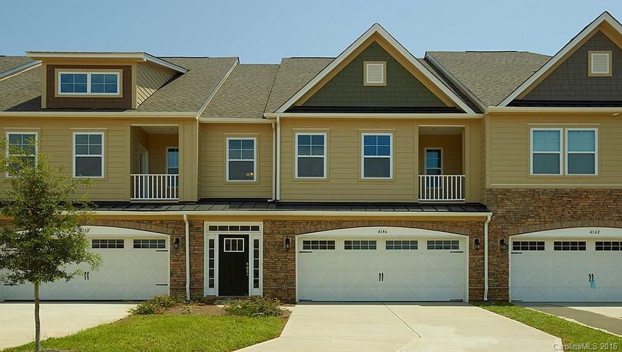 Open and airy master down luxury townhome with view of beautiful Lake Wylie! Immediate access to waterfront trail.  Loaded with beautiful upgrades including granite counters, tile backsplash and stainless appliances in kitchen. Luxurious master bath with granite tops and ceramic tile. Walk in closets in all bedrooms.   Large bedroom with huge walk-in closet upstairs may serve as second master bedroom.