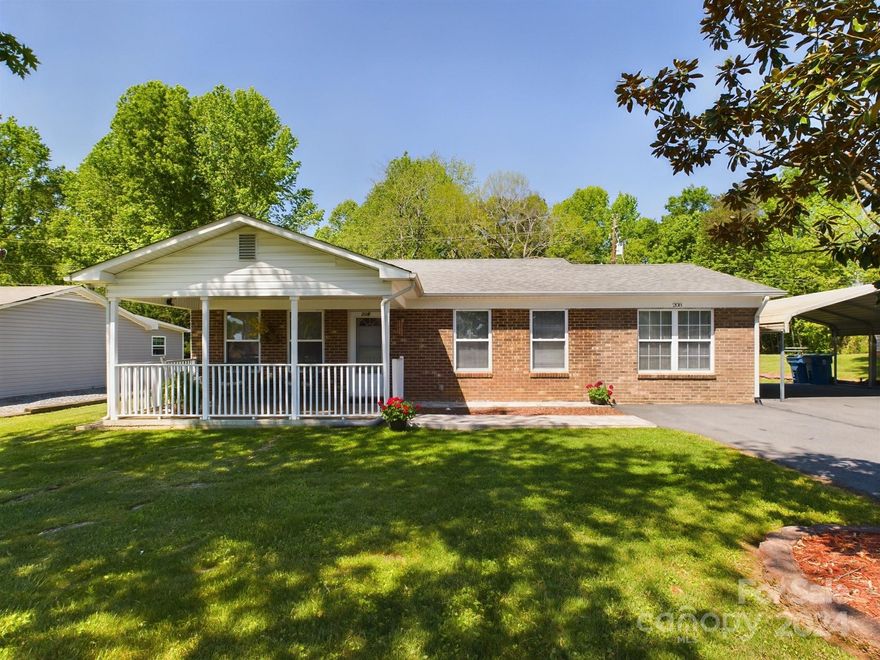 Step into this lovely 4 bedroom 1.5 bath rancher that marries the indoors with the outdoors.  With both a charming front and back porch it will make an ideal spot to entertain family and friends or simply take a nap in the serene setting of the back yard.  This well maintained home features an easy flow between living, dining, kitchen and bonus areas that lead you seamlessly into the back porch/ yard.  Tile floors throughout make it easy to maintain.  Special touches can be found throughout this gem such as a swanky mural of city scape in the bonus room, tiled tub/ shower surround, as well as tiled kitchen backsplash.  Low maintenance exterior includes partial brick and vinyl. Roof was replaced in 2019 and the driveway was asphalted. Convenient detached carport and storage shed included with plenty of parking space for your needs.  

Home is conveniently located in the charming town of Maiden NC, with easy access to Hwy 321 S.   Don’t miss out on this one. Schedule your tour soon!