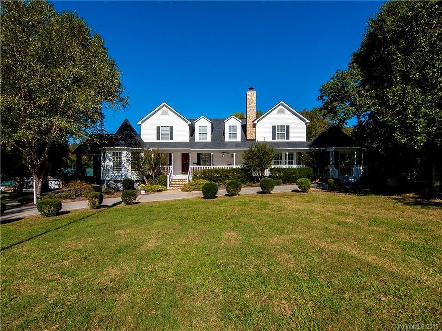 Fabulous country estate + 3,600 sf barn awaits you! Huge wraparound porch, beautiful grounds w/ abundant trees & flowering shrubs complete this serene setting. Convenient to I 77.  5BR + 5BA gives everyone space & privacy- ideal for multi-generation situation! Huge country kitchen, large laundry, office, 2 living areas, fabulous rock fireplace & gorgeous hardwood flrs. The barn has a chicken coop, water/septic & electric.
Soon to be seen on HGTV's "I Bought the Farm" series!