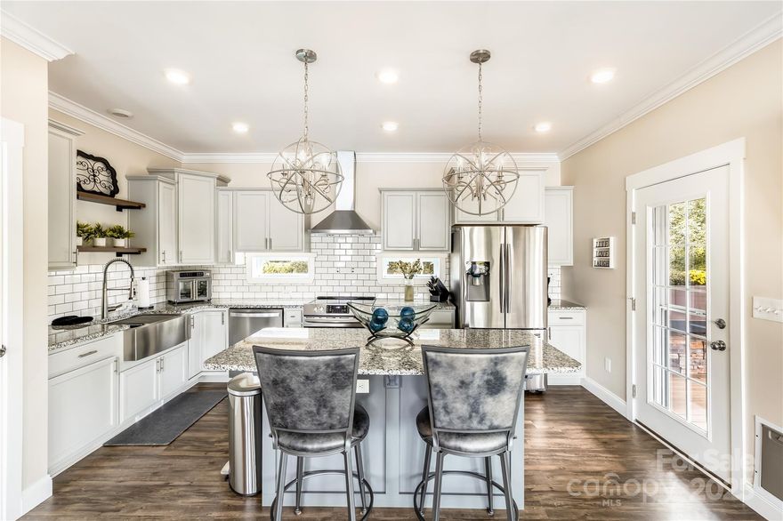 Waterfront Modular home built in 2019 with spectacular views of Badin Lake.
Open concept living & ample kitchen area that was designed for entertaining. Step outside to
the upper covered porch that is an extension of the dining area to the magnificent views
across the lake. The large master suite is located on the main level with a spacious walk-in
closet that houses the washer and dryer. The large en-suite bath offers a spa like large
tile shower with overhead rainfall shower head and a double vanity sink. The downstairs will
WOW you with a custom bar and living/entertainment area. A large secondary bedroom
with a bath that also features a custom tile shower and dual vanity. The lower patio has been
designed as another extension for entertainment with a feature wall perfect for an
outdoor television. It is also a fabulous spot to grill, play cornhole or just sit and enjoy the
views! Currently the home is being used as a fully furnished and functioning Airbnb!