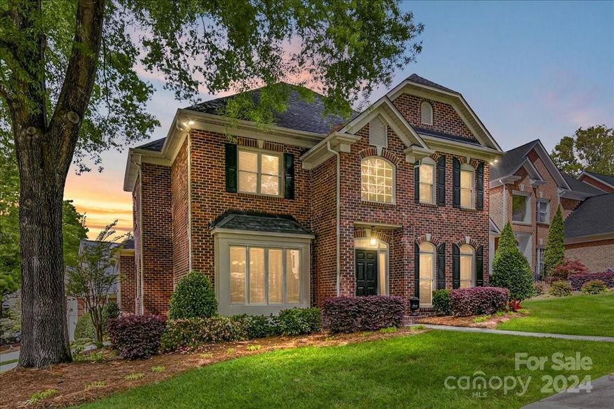 Unique Gated Community of Custom Homes in the "Heart of Ballantyne!" A true "One of a Kind" neighborhood surrounded by Walking Paths & Trees! Plus, HOA Maintains your Lawn! Sellers have Updated this Beauty w/ Refinished Hardwoods, New Lighting, New Moldings, Updated Baths & Kitchen and MORE! Private Office w/Doors, Iron Balusters on Staircase w/Wood Treads. Boxed Bay Window, Tray Ceiling & Moldings in Dining Rm. Cabinets in Laundry, new sink w/Granite. Powder Rm w/New Fixture & Framed Mirror. Lovely Oversized Great Rm w/Fireplace and Fan that also leads to Private Screened Porch w/Vaulted Ceiling. Heavily Landscaped for Privacy. Encapsulated Crawl Space! Newer Kitchen w/White Cabinets, Granite, new knobs, S/S Appliances, Roll out Drawers, Wall Oven & newer Ceramic Smooth Cooktop. Primary Bedroom Boasts of Tray Ceiling, Fan, Moldings, Closet System, Remodeled Glamour Bath, Frameless Shwr Door, Whirlpool, Sep Vanities! Bdrm 2 &3 Connect to Remodeled Jack n Jill Bath. Walk-in Storage!