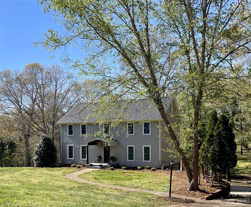 Location is everything! This home sits on a beautiful large lot consisting of 2+ acres on a very private dead end street. Located minutes from Forest City, Hwy 221 and Hwy 74, you will be hard pressed to find a more convenient and beautiful spot to call home.  The home itself has many updates which include: all new kitchen, new flooring throughout the home, new master bath and guest bath, added front porch, new deck on the back, new HVAC including duct work, new roof, repainted throughout, new moldings, many doors replaced, all new windows, and the list goes on! There is a large bonus room on the 3rd floor which can serve many purposes: office, playroom craft room etc. The unfinished basement has a 2 two car garage with new garage doors and room for a workshop. 
Do not let this one pass you by! No HOA. Listing Broker is the owner.