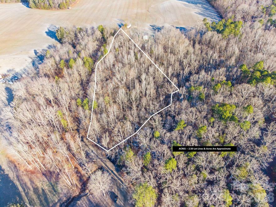 Enjoy 2.5 acres of peaceful country living, fully perc tested and surveyed—ready for your dream home. This exceptional property is a rare opportunity in the up-and-coming Kannapolis area, offering privacy, space, and natural beauty. Tucked away in a serene setting, the expansive landscape provides the perfect backdrop to bring your vision to life. Whether you imagine a cozy cabin among the trees, a modern retreat on a gentle hillside, or a rustic chalet overlooking a creek, this land offers endless possibilities. Embrace the tranquility of rural living while still enjoying an easy commute to Charlotte and all the amenities it has to offer.
