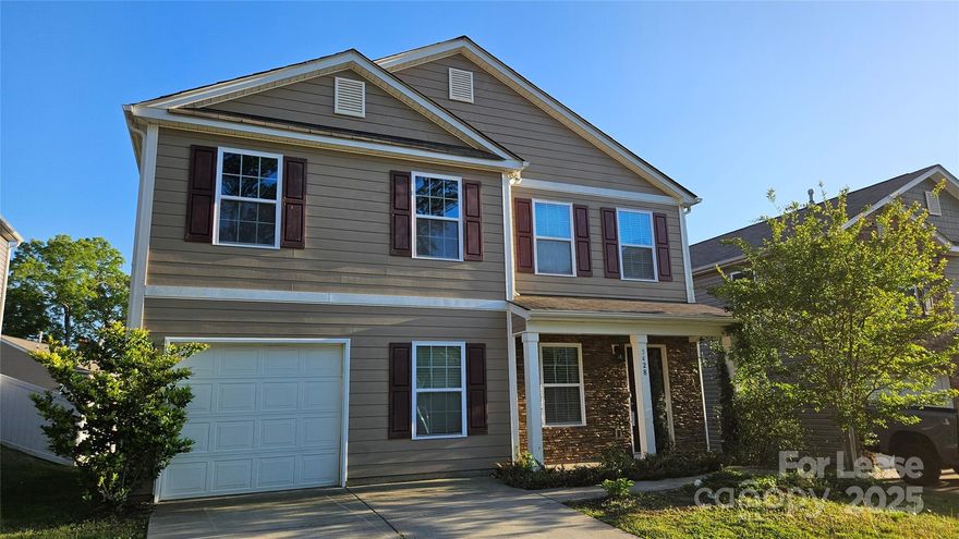 This spacious 3-bedroom, 2.5-bath home has over 1800 sq ft of living space, a one-car garage, and a full backyard with a patio. It has fresh paint throughout and an open floor plan. The kitchen features granite countertops, a kitchen island, and stainless steel appliances. The second floor contains all three bedrooms, two full bathrooms, and the laundry room. The master bedroom features a full bathroom and an oversized walk-in closet. Easy access to I-77.