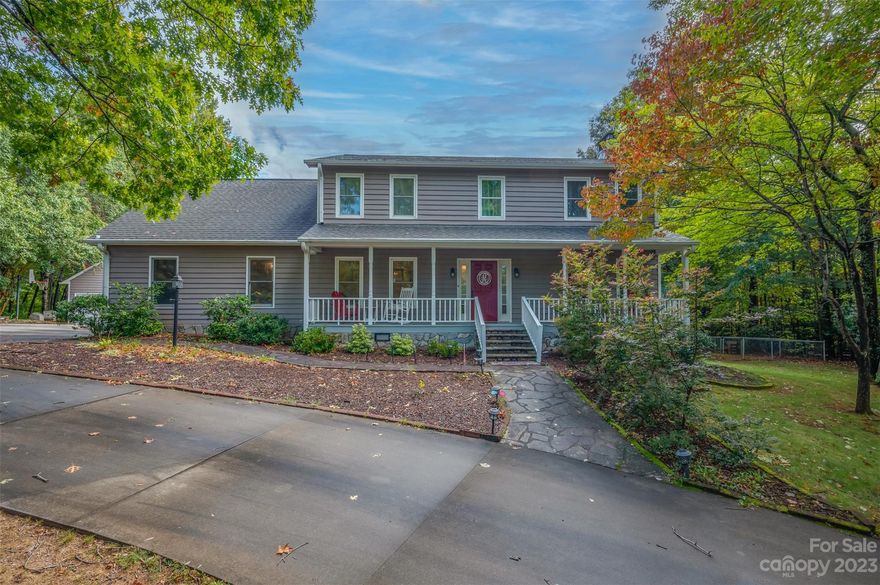 Privately located on 1.90 acres with beautiful mountain views from your front yard! This spacious two story home has all the room your family and guests will need with 4BR 3.5 baths and more. The main level features a large living room with fireplace & built ins, updated kitchen with granite counters, center island, stainless appliances and adjoining breakfast nook and formal dining room. 4 bedrooms on the second level plus an office/sitting room. Partially finished basement offers family room w/fireplace and full bath (not included in finished SF). Every day feels like vacation with the beautiful salt water pool and outdoor entertaining areas. Large deck and screened porch overlooking the expansive pool/patio area. In addition to the double attached garage, there is a three car detached garage with a finished apartment w/approx 700 SF for extended family, guests or income opportunity. Circular paved driveway and plenty of paved parking.