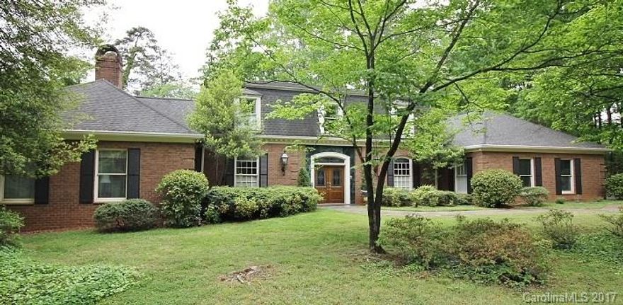 Amazing golf course home w/in-ground pool in gated, WF community of River Hills. Exquisite brick home overlooks the 7th green w/pond. Elegant sized rms. Library w/wet bar, DR & LVR w/frplcs. 2nd Master on main w/frplc. Gourmet Eat-in Kitch opens to Den & covered brick patio. Sun rm. Master w/his/her WIC, Balcony Master Bath Dbl. sink vanity, shower & jetted tub. 2 spacious bedrms w/full baths up. Art studio. Laundry/Pantry. Terrace off LVR. Media/Rec rm, Sauna, Hot tub, Office, Exercise.