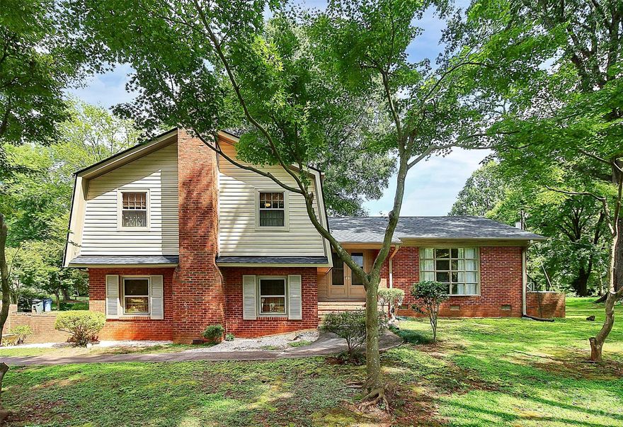 Discover Your Dream Home on 1.3+ Acres with No HOA. Welcome to your perfect oasis! This immaculate home, lovingly maintained and upgraded with a new roof in 2023 and HVAC in 2021. This property offers both space and privacy, complemented by a stunning treed landscape and a picturesque lake view from the front yard. With an abundance of rooms to meet all your needs, this home has comfort and versatility. Inside, you'll find a Formal Living Room, Dining Room, a cozy Den with a fireplace, and a versatile Bonus/Flex space .The heart of this home is the generous kitchen, complete with an inviting island and free-standing cabinets. The oversized bedrooms are perfect for rest and relaxation.Step outside onto the huge deck, where you can bask in the beauty of your expansive backyard. Additional features include a nice-sized workshop and storage building, ideal for DIY enthusiasts and those in need of extra storage space. Peaceful setting close to up and coming downtown Mint Hill/485.