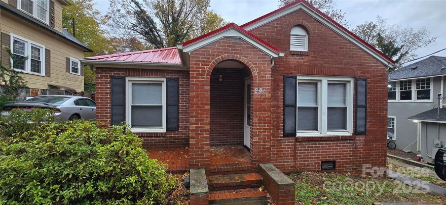 Charming 2 bedroom, 1 bath home in downtown Lenoir. Brick exterior, wood flooring, spacious back yard. Walking distances to shopping and dining.