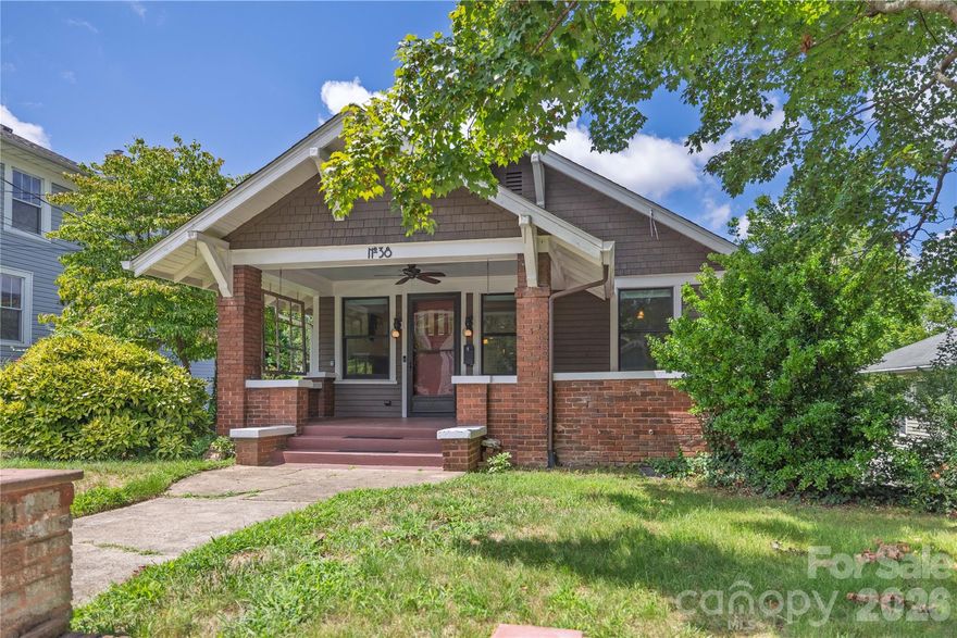 This North Asheville bungalow blends timeless character with modern updates in a location that offers charm & convenience. Featuring 3 bedrooms & 2 beautifully remodeled baths, the home showcases a new roof in 2026, original hardwood floors, built-ins, and craftsman details. A welcoming front porch opens to a living room w/ a wood-burning fireplace and elegant dividers leading to a dining room w/ wainscoting & coffered ceilings. At the heart of the home, the fully renovated kitchen shines with high-end finishes, perfect for everyday living or entertaining. Enjoy outdoor living w/ a large deck & fenced backyard on a .2-acre lot, w/ potential for a private driveway. Just a short stroll on the sidewalk lined street to Weaver Park, Reed Creek Greenway, Grove Park Inn, & one mile to downtown Asheville. The unfinished basement is an opportunity to add a guest suite or additional living space. This home is a rare find with historic style, prime location with the comfort of new roof (2026), and newer plumbing, electrical & HVAC/furnace.