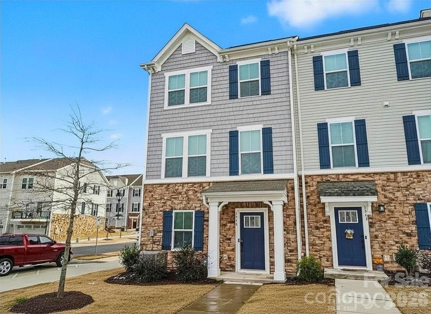 Forget the standard "builder-grade" shuffle. This 2023 corner townhome isn’t your average place to live— the list of upgrades is extensive and the corner lot offers more privacy and openness that most townhomes simply can't compete with. 
-Great news for future owners! There is No separate Water bill as it is included with the HOA.

The main level is an open-concept playground. Coastal Setting Oak Rigid Core LVP floors flow seamlessly across the level, offering a warm, organic look that’s as durable as it is beautiful. The kitchen is a showstopper, anchored by an oversized island and draped in Quartz Carrara Marmi countertops. Whether you’re hosting a dinner party under the upgraded LED overhead lighting or enjoying a quiet morning, the open floor concept ensures you stay connected to the action. 

The third floor is all about comfort. Sink into the Golden Cove Cascade carpet with an upgraded pad making every step feel like a cloud. The owners suite spa-inspired bath is a masterclass in clean design, featuring Cavanite White 13x13 tiles and a walk-in shower with a built-in seat. Even the practical details were elevated—like upgraded comfort-height toilets and custom window shade covers already installed on every single window.

On the lower level, tucked behind elegant French doors with its own private half-bath is the ultimate flex space. It’s the perfect home office, creative studio, or home theatre. And for the modern professional, this home is "tech-proofed": with CAT 6 ethernet ports and a dedicated network panel, your connection will be as seamless as your commute. Finally, the additional room can become a home gym, a climate-controlled storage sanctuary, or a private fourth bedroom for guests.

It’s not common to find a home that actually feels this finished on day one.