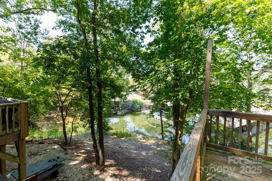 Do you want to feel like you are on vacation in your own home? With Fort Mills Schools? This home provides a lake view and access. Take your kayak or paddle board out when you get the urge for the lake life your friends will be jealous of. Plenty of birds and wildlife to see, including the beavers that come out in the evening. This 2br/1ba home is warm and inviting, perfect for you or your renters. With no HOA, your imagination is the limit. New flooring and paint throughout, custom cabinets in the new kitchen, and a newer bathroom. Come see your new view before it's too late!