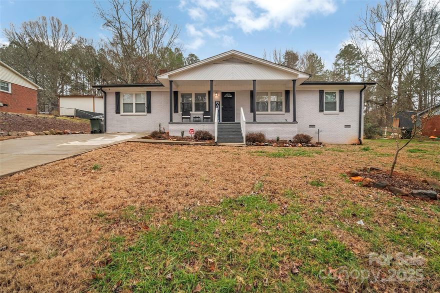 Beautifully renovated 3-bedroom, 2-bath brick ranch on nearly half an acre, just minutes from downtown Bessemer City. This open-concept home includes a bonus room perfect for an office or flex space. The kitchen features stainless steel appliances and is complemented by vinyl plank flooring, plush carpet, and tile finishes throughout.
Enjoy a fenced backyard with a large in-ground pool, now safely gated for added security. The backyard shed has been transformed into a fully equipped pool house with electrical outlets, lighting, and air conditioning—great for guests or a creative workspace. A covered back porch offers the perfect spot for outdoor dining and relaxation.
Located near Bessemer City Park and all the amenities of downtown, this home blends comfort, style, and convenience.  Don’t miss out—schedule your showing today and make this updated home yours!