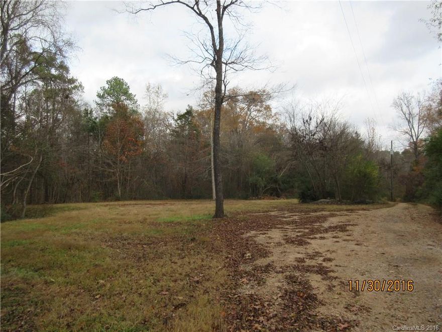 Wonderful opportunity to own 8 plus acres and build your dream home. Private location with easy access to Highway 521 and SC route 5. Ideal location for easy commute to Charlotte, Rock Hill, or Lancaster.