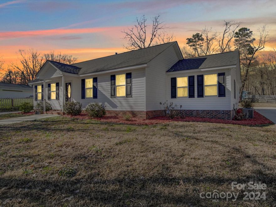 Experience the epitome of suburban living in Monroe, NC, with this exquisite single-family residence at 3806 Dusty Hollow Rd. With 2 beautifully appointed bedrooms and 2 full baths, this home spans 1,478 sqft of remodeled space. Set on a large lot, it offers a unique blend of indoor comfort and outdoor leisure. The highlight is the expansive carport, doubling as an entertainment oasis. Inside you will find fresh paint and LVP throughout. Outdoors, the wrap-around concrete driveway and a handy storage shed enhance both functionality and aesthetics. This move-in-ready abode is a testament to modern design and convenience, waiting to be your next home sweet home.